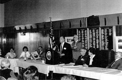 Image of speaker at an annual meeting